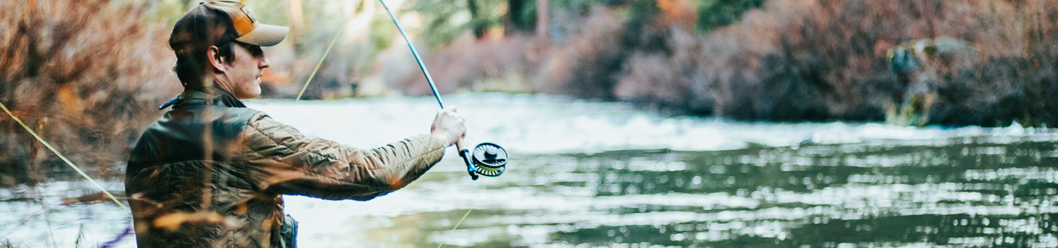 Photo of Man Fishing in a Lake